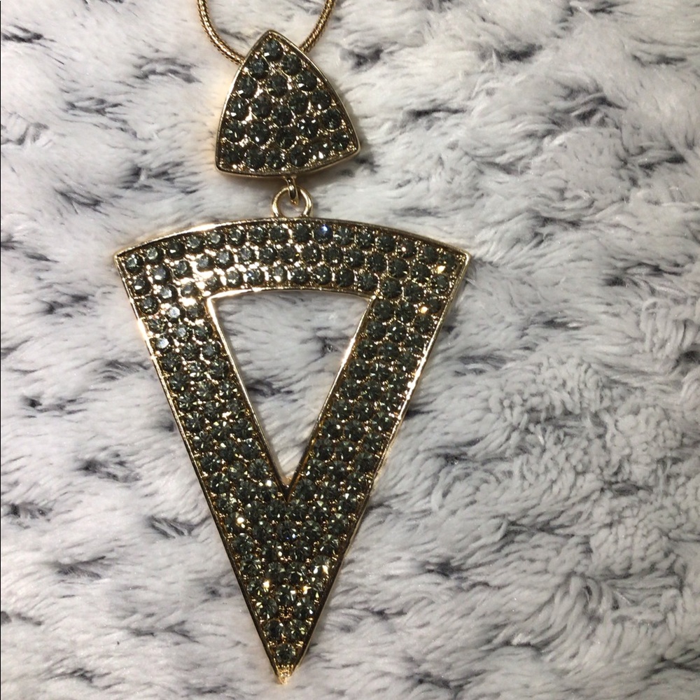 NWT long gold necklace with dark green rhinestones